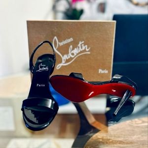 A pair of brand new Louboutin Heels